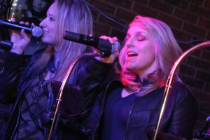 Retrospect Band vocalists Tara and Aimee perform at a recent Retrospect Band showcase
